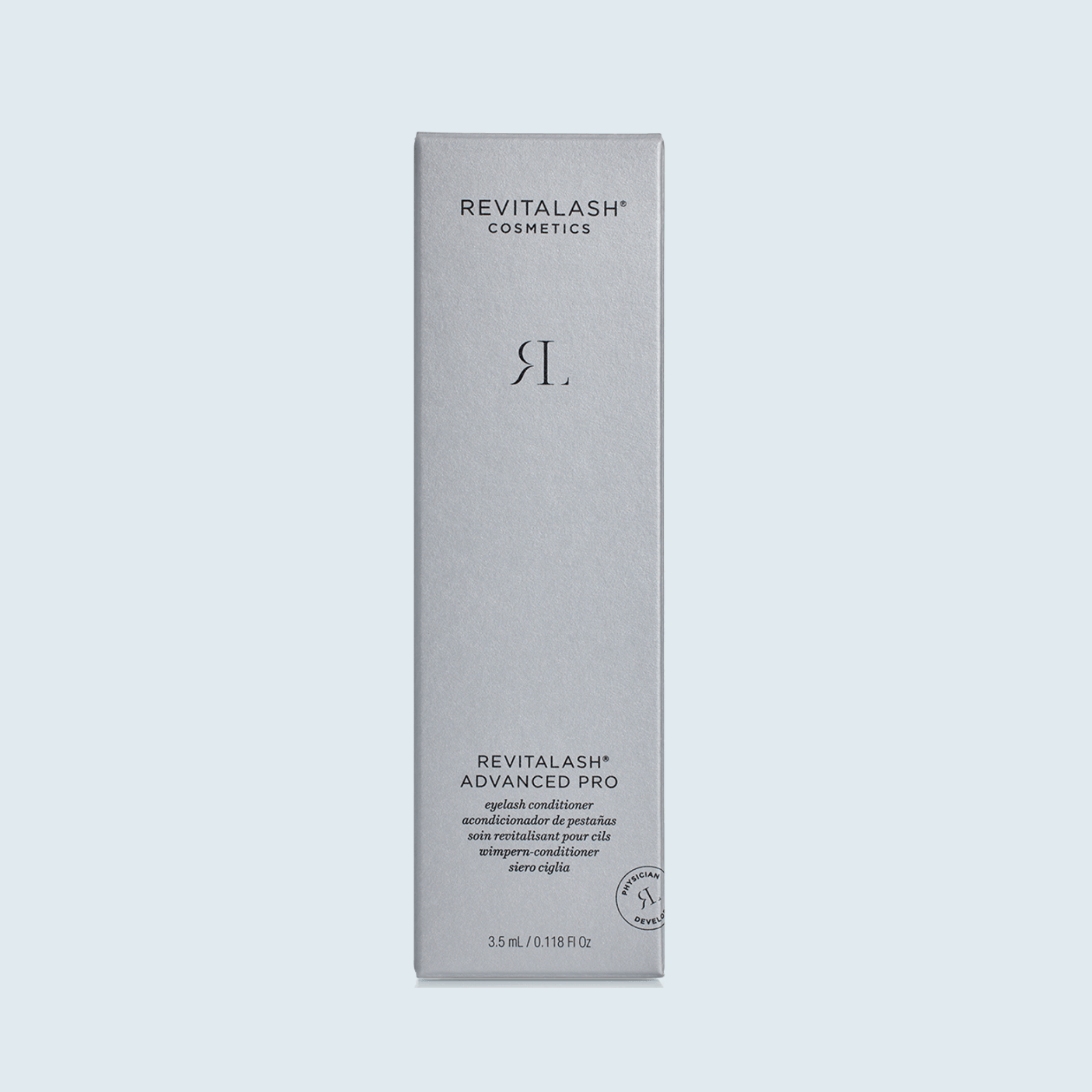 RevitaLash Advanced Pro Eyelash Conditioner 3.5ml silver carton on a pale blue background