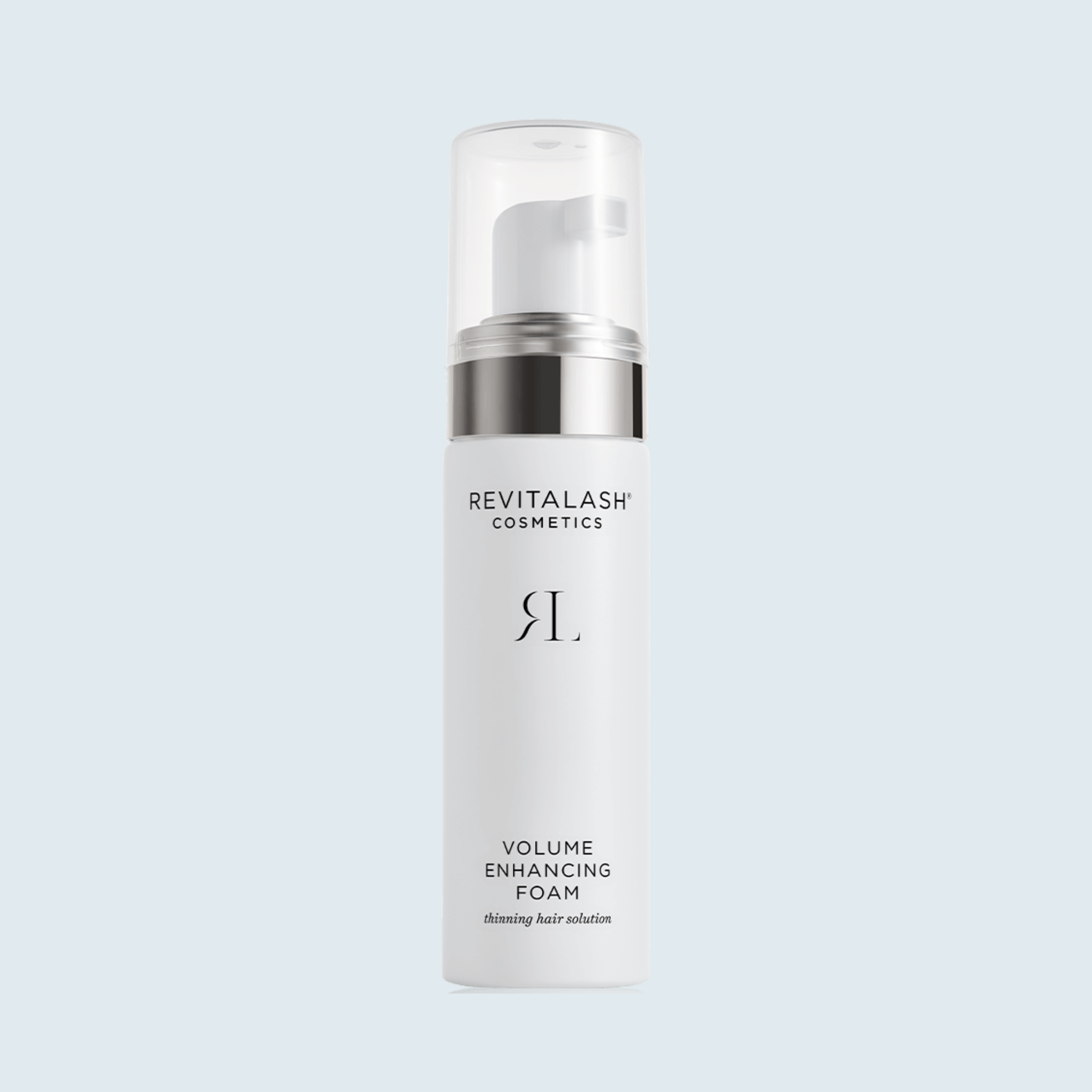 RevitaLash Volume Enhancing Foam 55ml pump bottle on a pale blue background