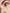 Close-up of a model's eye showing conditioned lashes and brow