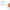 PCA Skin Sheer Tint Broad Spectrum SPF 45 tinted texture in a glass dish, with its mineral filters titanium dioxide and zinc oxide